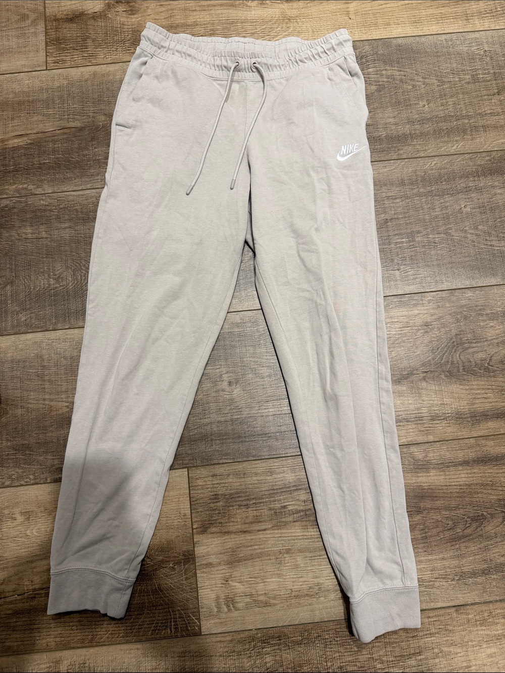 Nike women’s Light brown Sweatpants with White Swoosh